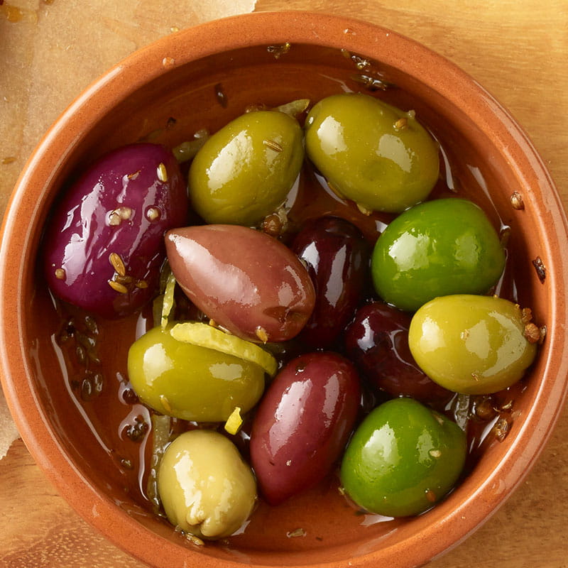 Маслини мариновані у кумині та коріандрі