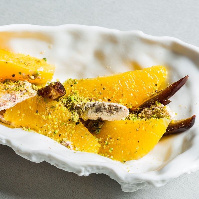 Апельсин з гарячою халвою та розмарином