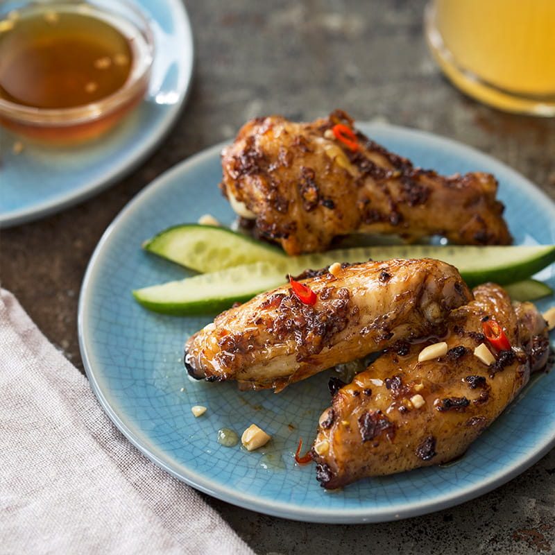 Кисло солодкі курячі крильця мариновані у карі ренданг
